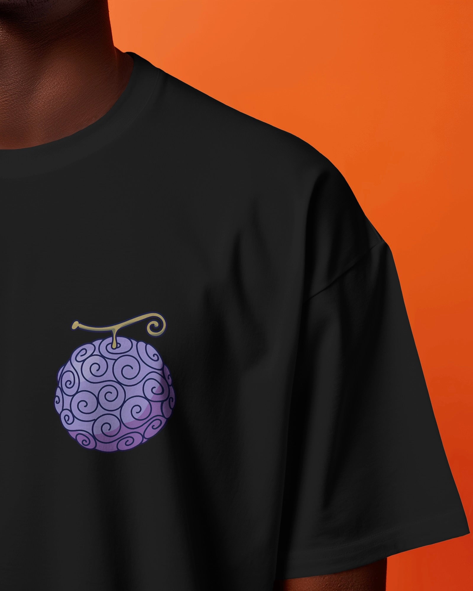 Image of the Gomu Gomu no Mi One Piece t-shirt featuring a classic round neck design. This unisex anime t-shirt showcases vibrant graphics inspired by the popular series, ideal for fans of all ages, in black colour from front.