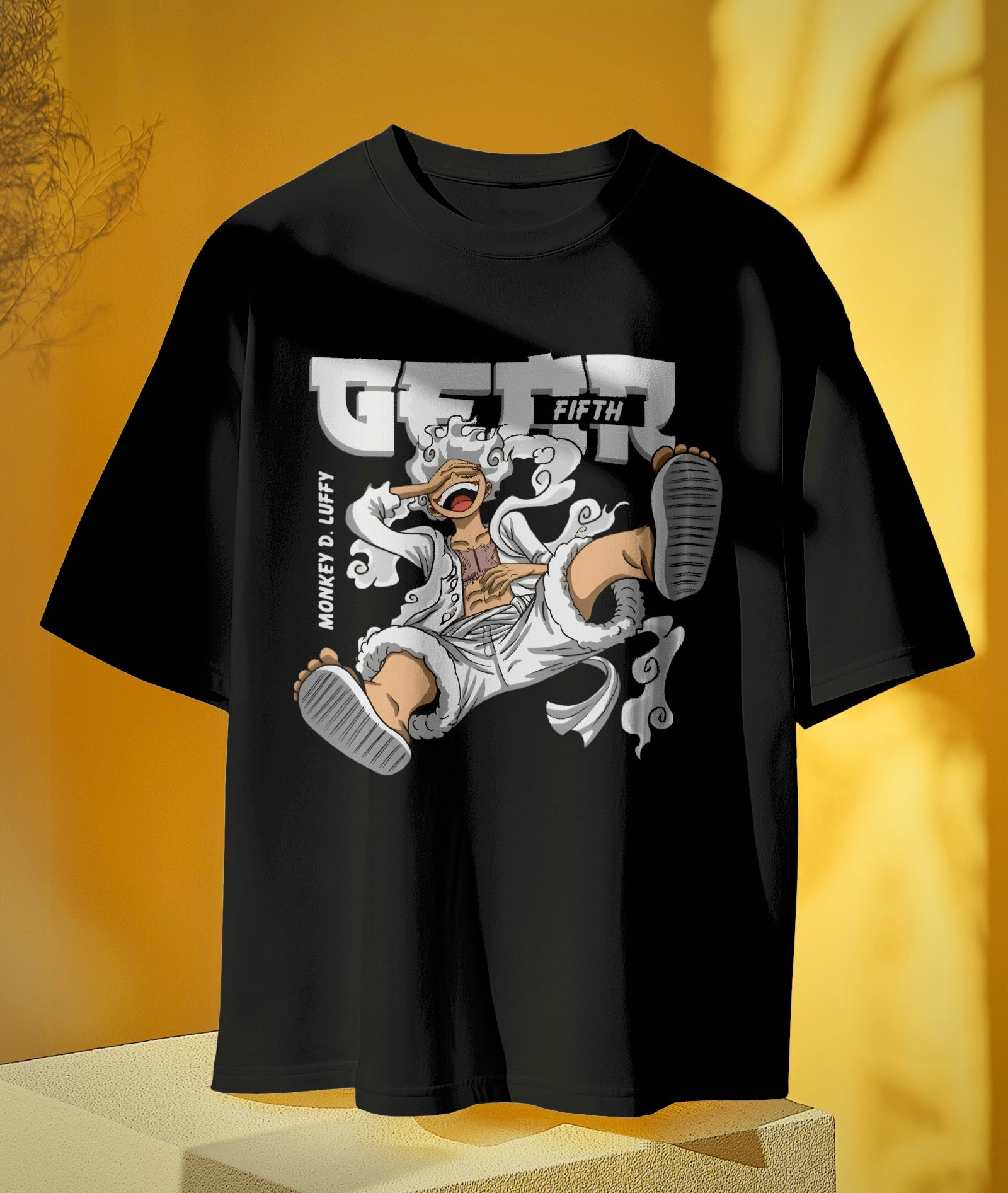 Luffy Gear 5 Unisex Oversized One Piece t-shirt, an anime t-shirt made from durable 180 GSM 100% cotton. Features a pre-shrunk unisex fit with a Lycra ribbed neck for a snug, comfortable fit, perfect for anime fans.In black colour from front.