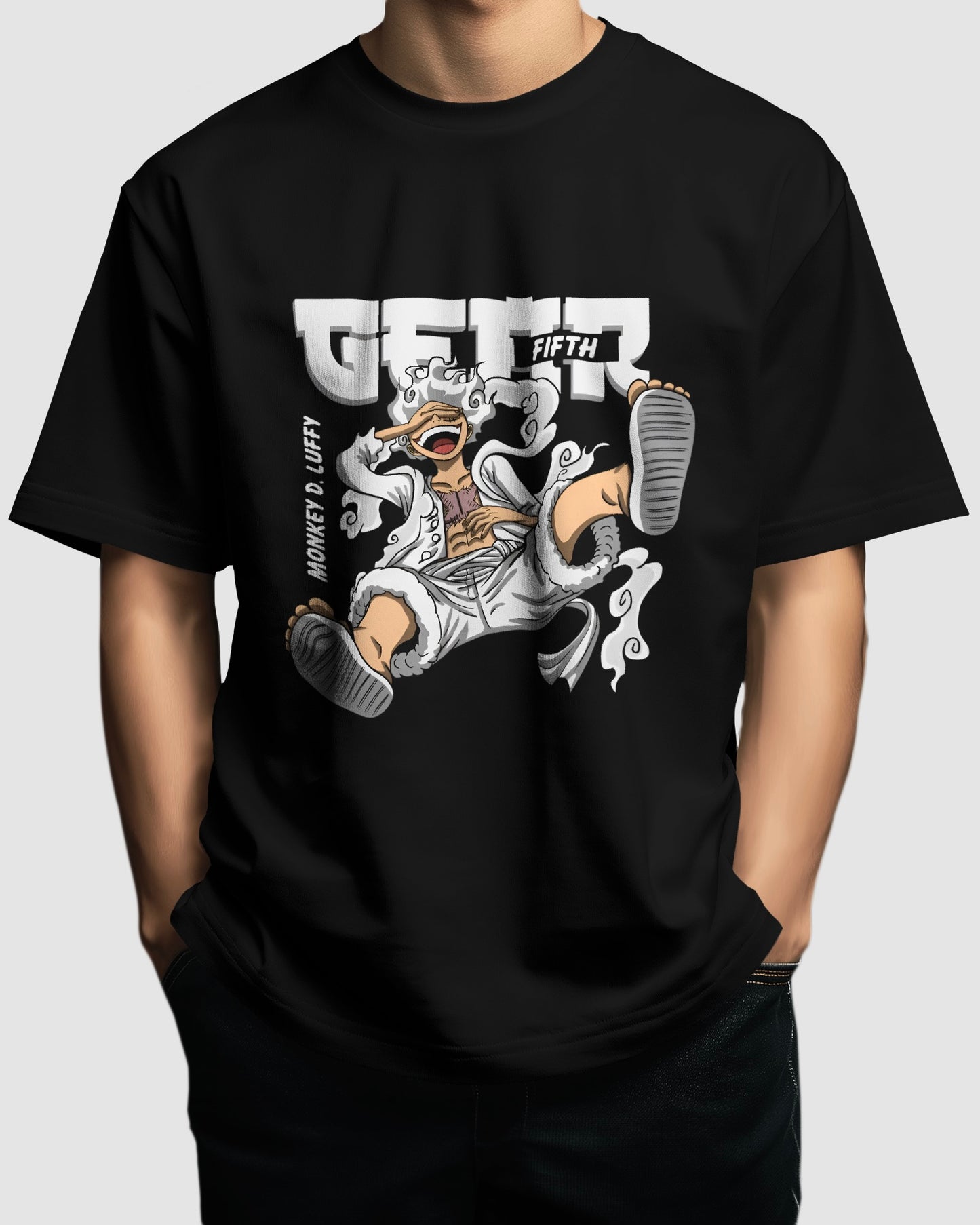 Luffy Gear 5 Unisex Oversized One Piece t-shirt, an anime t-shirt made from durable 180 GSM 100% cotton. Features a pre-shrunk unisex fit with a Lycra ribbed neck for a snug, comfortable fit, perfect for anime fans.In black colour from front.