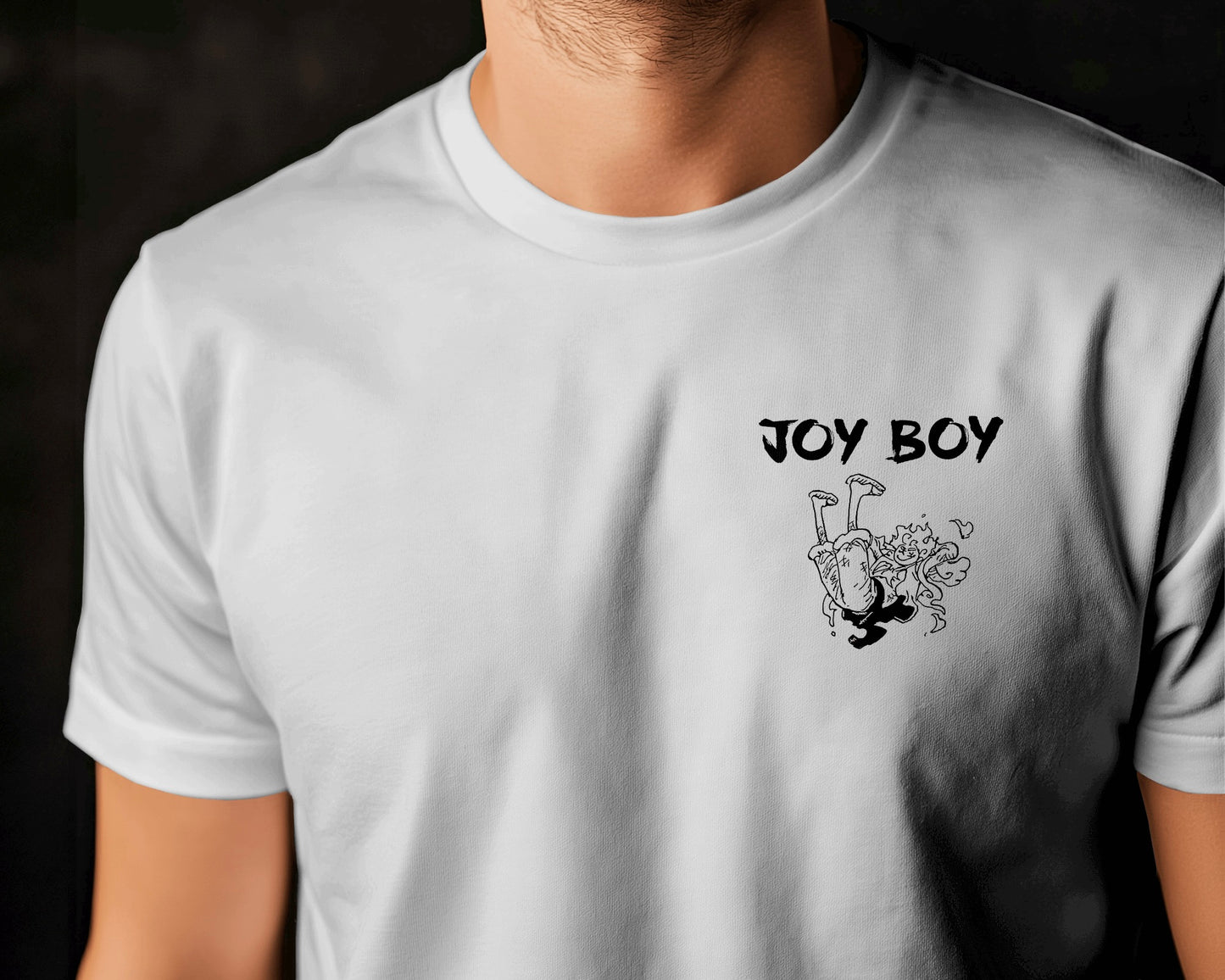 Joy Boy One Piece t-shirt, an anime t-shirt featuring a unisex classic regular fit and round neck design, crafted from durable 180 GSM super combed cotton for softness and breathability. Ideal for anime fans, this t-shirt showcases vibrant graphics and includes a Lycra ribbed neck for a snug fit. In white colour from front.